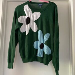Green with white and blue flowers crew neck sweater